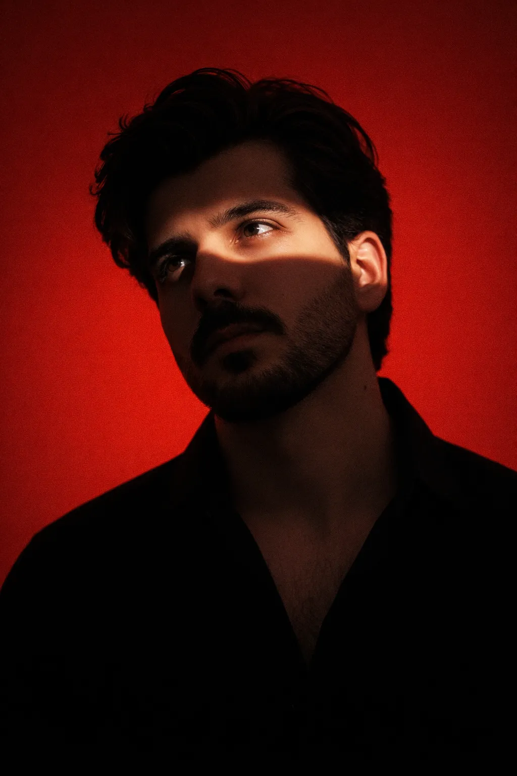 vertical beam of orange light teal background